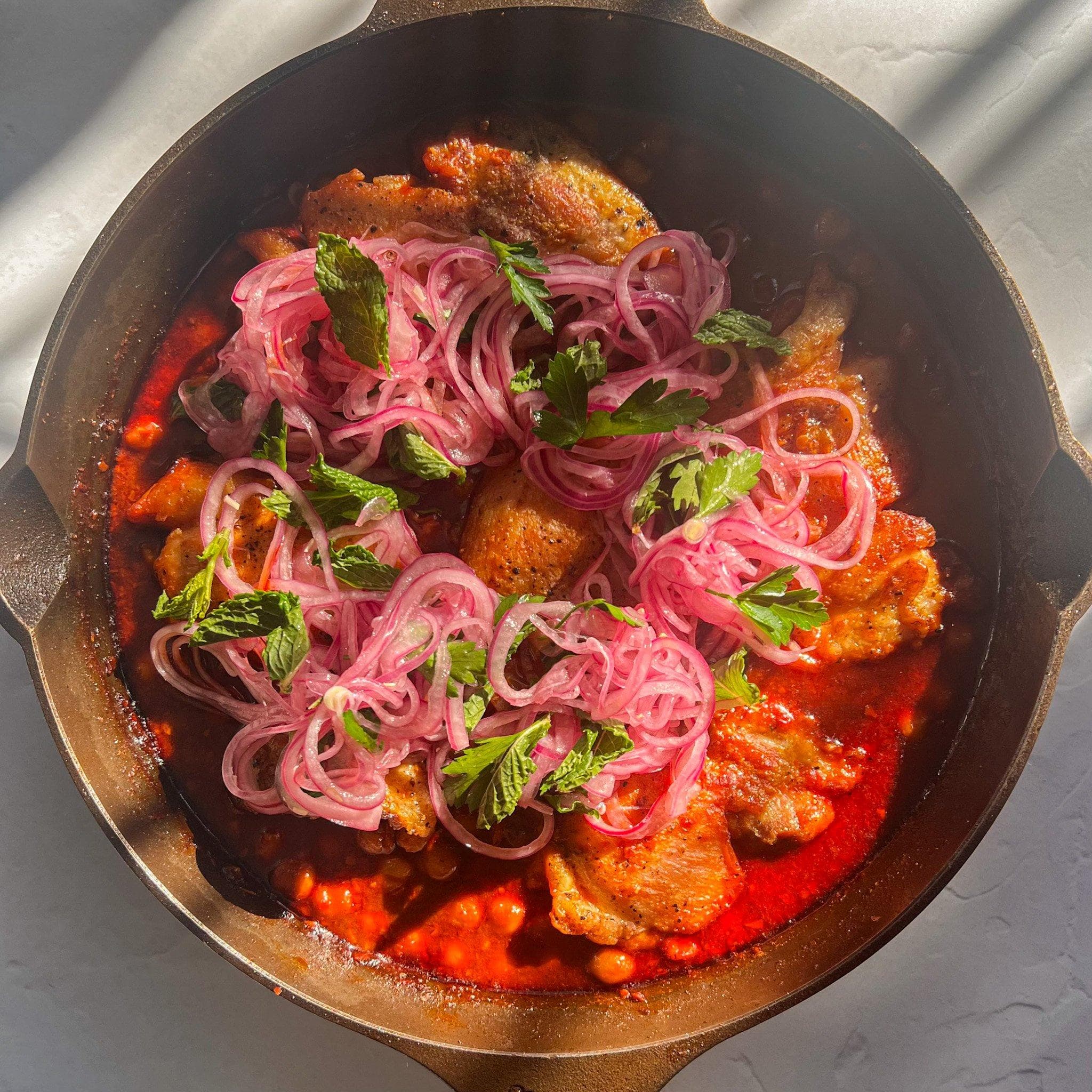 Skillet Harissa Chicken with Saucy Chickpeas